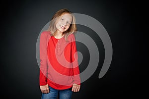 Little girl standing casually