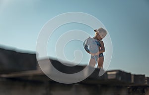 Little girl standing with fishing net