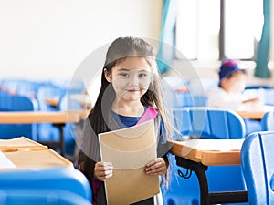 little girl student in the classroom