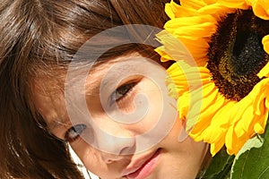 Little Girl and Sunflower