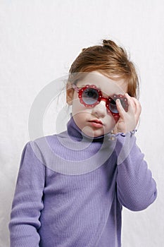 Little girl in sunglasses