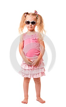 A little girl with sunglasses isolated on white