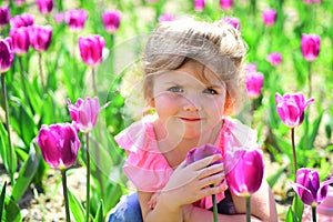 Little girl in sunny spring. Summer girl fashion. Happy childhood. face and skincare. allergy to flower. Springtime
