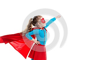 Little girl superhero in a red cloak and mask isolated on white background.
