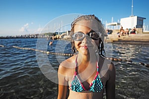 Little girl with swimming glasses