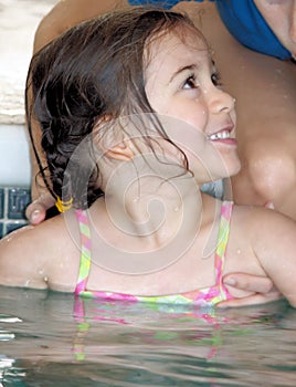 Little girl swimming lesson