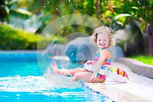 Little girl in a swimming pool