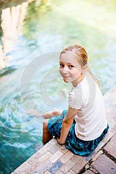 Little girl in swimming pool