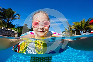 Little girl in swimming pool