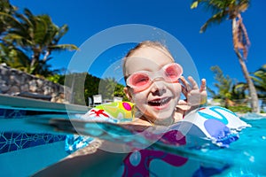 Little girl in swimming pool