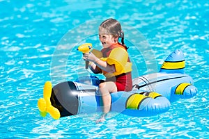 Little girl in swimming pool