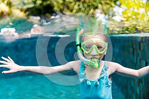 Little girl in swimming pool