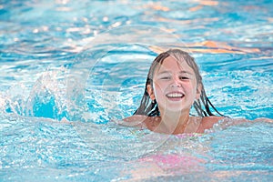 Little girl in swimming pool