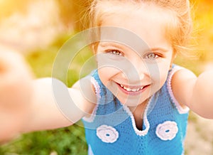 Little girl taken pictures of her self