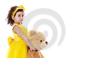 Little girl with teddy bear.Isolated on white background.