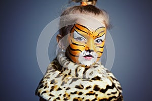 Little girl with tiger costume