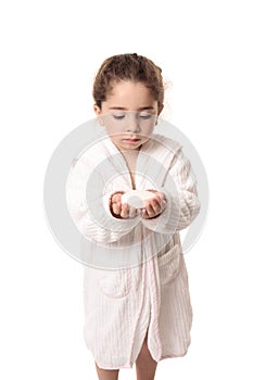 Little girl about to wash her hands with soap