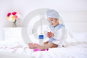 Little girl in a towel after bath