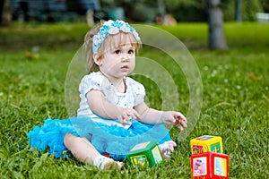 Little girl with toys