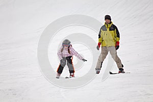 Little girl training alpine skiing