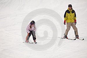 Little girl training alpine skiing