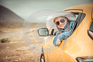 Little girl traveling by car