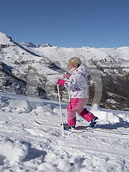 Little girl tries to ski