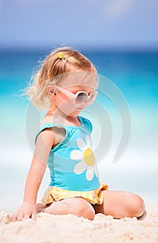 Little girl at tropical beach