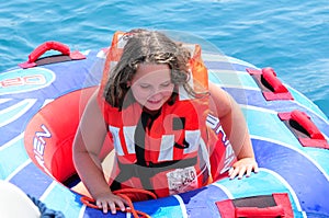 LITTLE GIRL TUBING photo