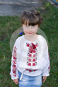 Little girl in Ukrainian blouse