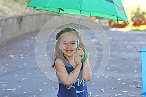 A little girl with an umbrella