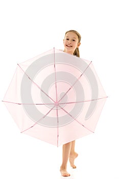 Little girl with umbrella.Concept style and fashion. Isolated on white background.