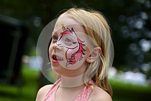 Little Girl with Unicorn Painted on Face