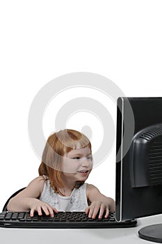 Little Girl Using Computer