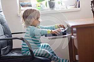 Little Girl Using Computer