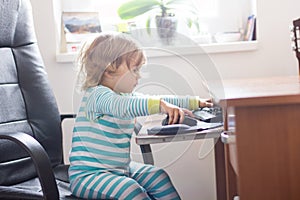 Little Girl Using Computer