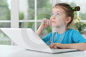 Little girl using computer