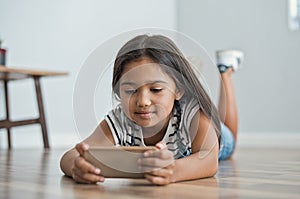Little girl using mobile phone