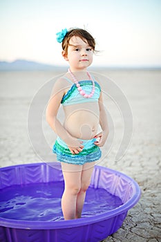 Little Girl Vintage Bathing Suit in Plastic Pool