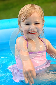 Little Girl in Wading Pool photo