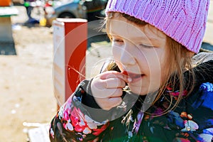 Little girl on a walk outdoors.