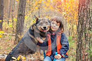 Little girl walking with dog