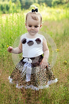 Little girl walking in the nature