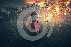 Little girl watching butterflies