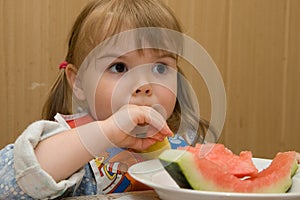 A little girl with watermelon