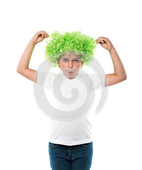 little girl wearing green wig