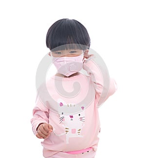 Little girl wearing a mask in front of white background