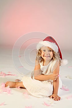 Little girl wearing Santa hat