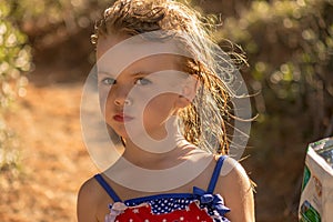 A little girl with wet hair