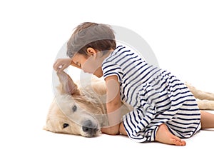 Little girl whispering to her dog isolated